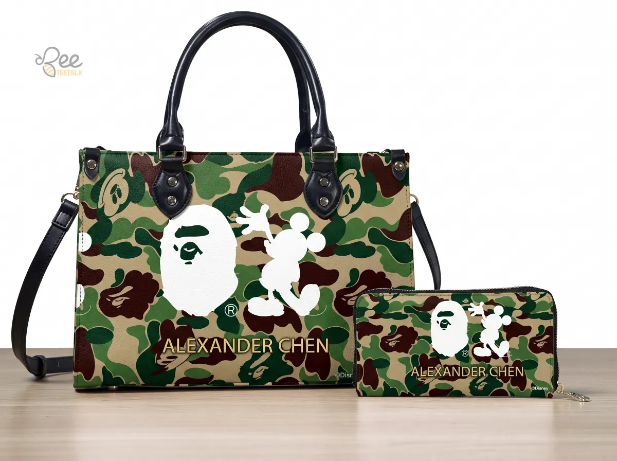 Custom name bape x disney mickey mouse camo print leather handbag and wallet set asset #4 The full handbag and wallet set arranged for a product display.
