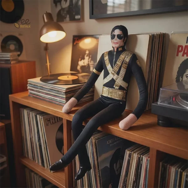 Michael Jackson Iconic Eras Funny Collectible Plush Dolls Toy Gift 6 Fifth doll with a blue shimmering jacket sitting on the dresser.