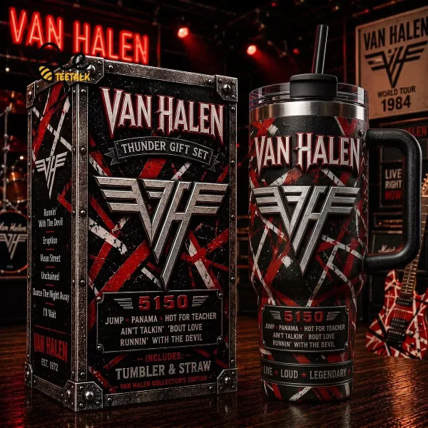 Musician desk setup with Van Halen tumbler and guitar